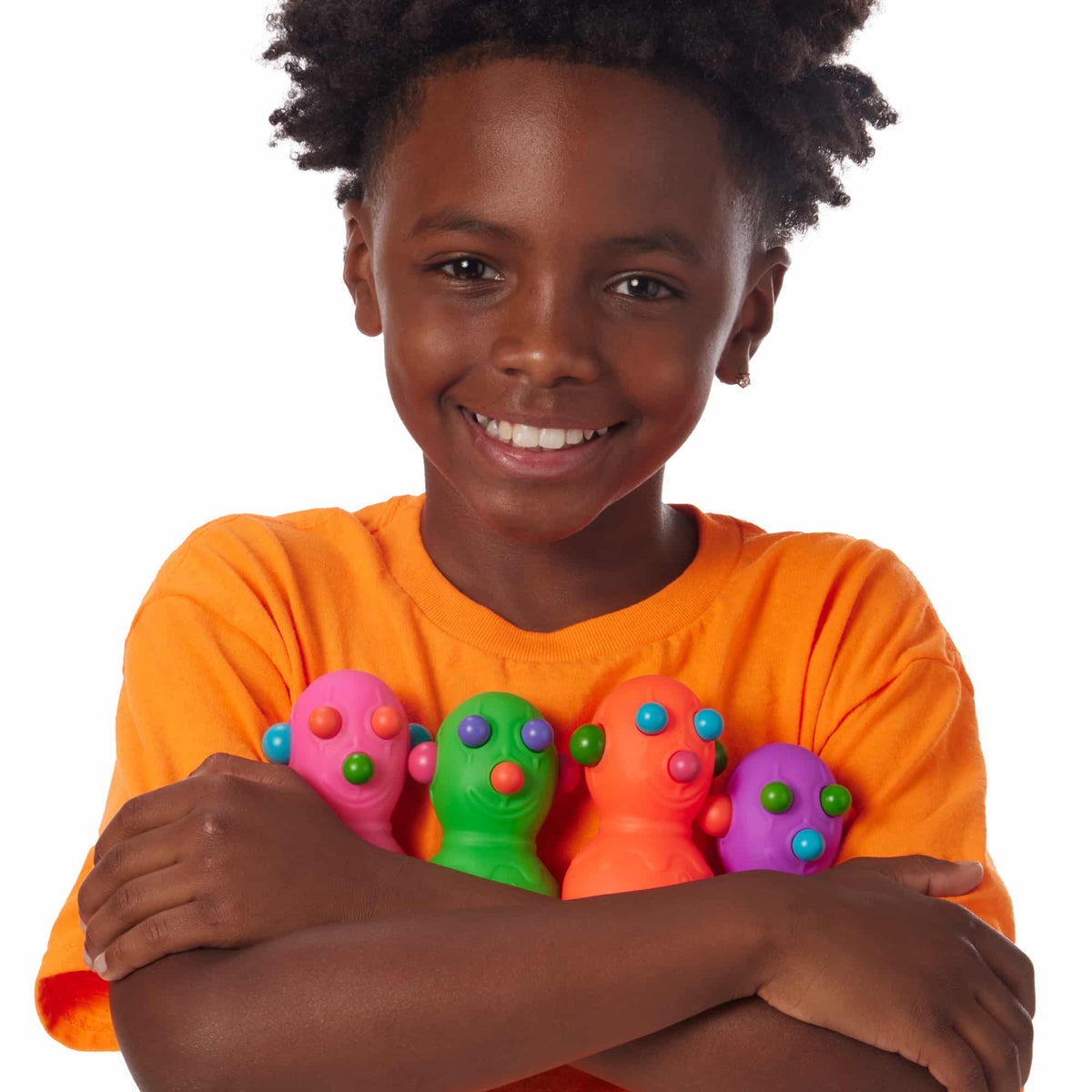 NeeDoh Panic Pete Lifestyle with boy hugging all 4 Panic Pete colors
